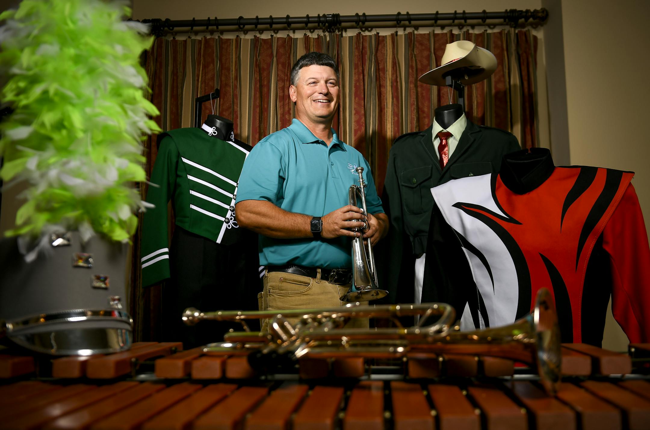 Marching band enthusiast Brent Turner in his Apple Valley home.