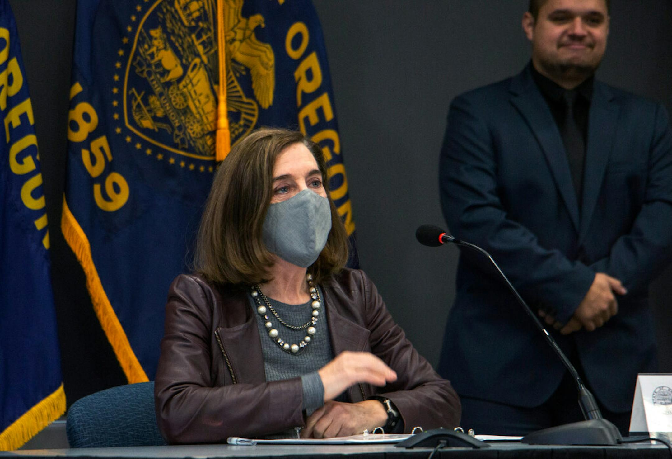 Gov. Kate Brown of Oregon seen on Nov. 10, has imposed strict measures, with a two-week freeze on many activities from Nov. 18 through Dec. 2. Oregon also has a statewide mask mandate.
