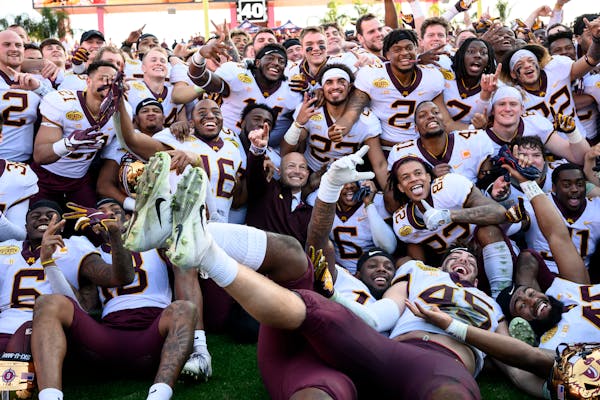 The Gophers celebrated after defeating Auburn in the Outback Bowl on Jan. 1, 2020 at Raymond James Stadium in Tampa, Fla.