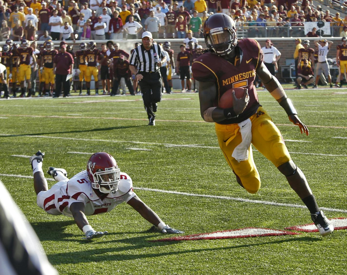 University of Minnesota vs. New Mexico State football. New Mexico State won 28-21. Gophers quarterback MarQueis Gray beat New Mexicao State defender Julius Flemming to the end zone for a supposed touchdown to tie the score in the fourth quarter, but was called out of bounds on the 1 yard line. Minnesota was unable to score from there.