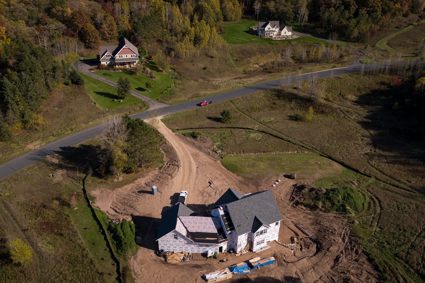 A home is under construction in Birch Park Friday afternoon. ] AARON LAVINSKY &#xef; aaron.lavinsky@startribune.com Homebuilding in St. Croix County, Wis., once the state's fastest-growing county, continues a slow rebound. The western county, now linked to the metro area with a new St. Croix River bridge, saw 294 new homes started this year through September. We photograph some of the construction on Friday, Oct. 13, 2017 in St. Croix County, Wis.