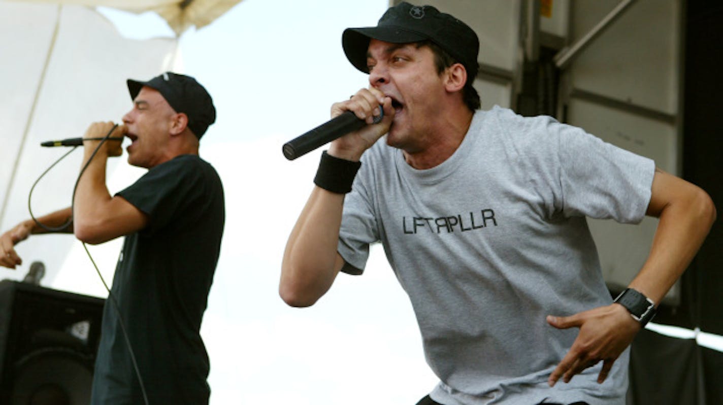 Crescent Moon and Slug on stage together when Atmosphere played Warped Tour in 2004. / Jerry Holt, Star Tribune