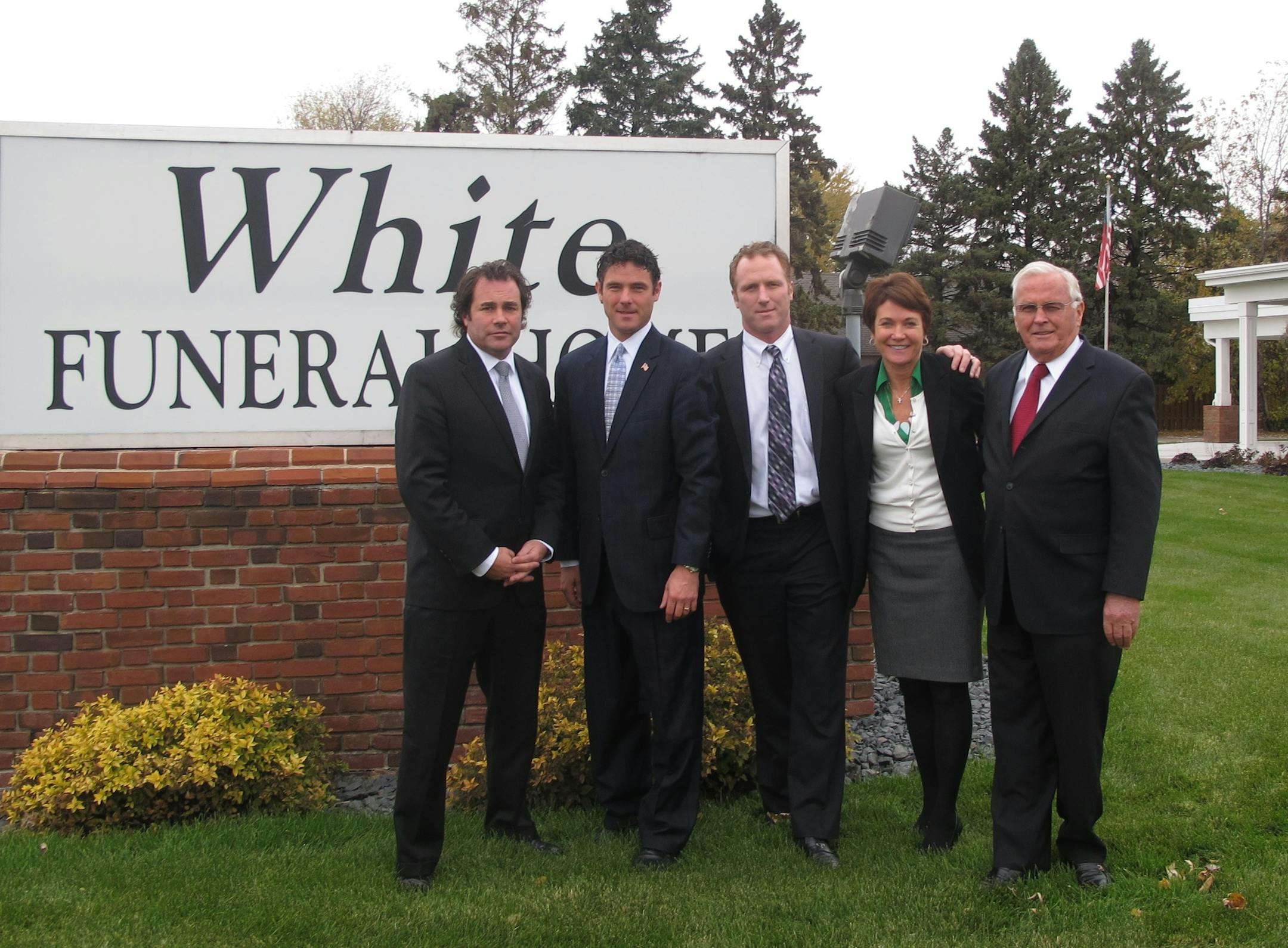 Photo by Erin Adler From left: Mike White, John White, Jim White Jr., Meg White Heintze, and Jim White of White Funeral Home in Lakeville.