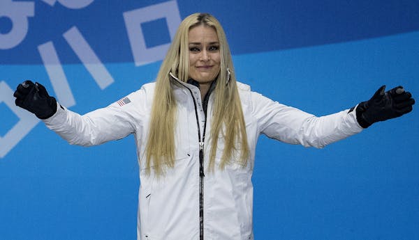 Lindsey Vonn of the USA prepared to take the podium and be presented with the bronze medal at Pyeongchang Olympic Plaza on Wednesday. Vonn won the Bro