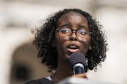Isra Hirsi, 16, of Minneapolis, co-director and co-founder of U.S. Youth Climate Strike, spoke during the rally at the Capitol.