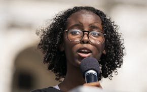 Isra Hirsi, 16, of Minneapolis, co-director and co-founder of U.S. Youth Climate Strike, spoke during the rally at the Capitol.