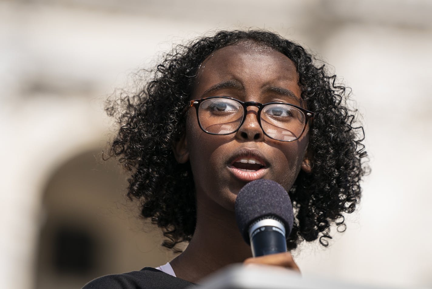 Isra Hirsi, 16, of Minneapolis, co-director and co-founder of U.S. Youth Climate Strike, spoke during the rally at the Capitol.