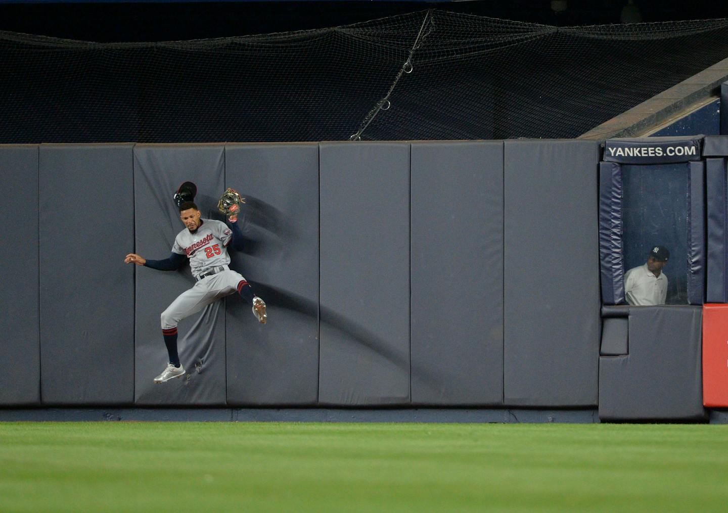 Minnesota Twins center fielder Byron Buxton crashes into center field wall while making the catch on on a fly ball by the New York Yankees' Todd Frazier in the American League Wild Card game at Yankee Stadium in New York on Tuesday, Oct. 3, 2017. (Howard Simmons/New York Daily News/TNS) ORG XMIT: 1212512