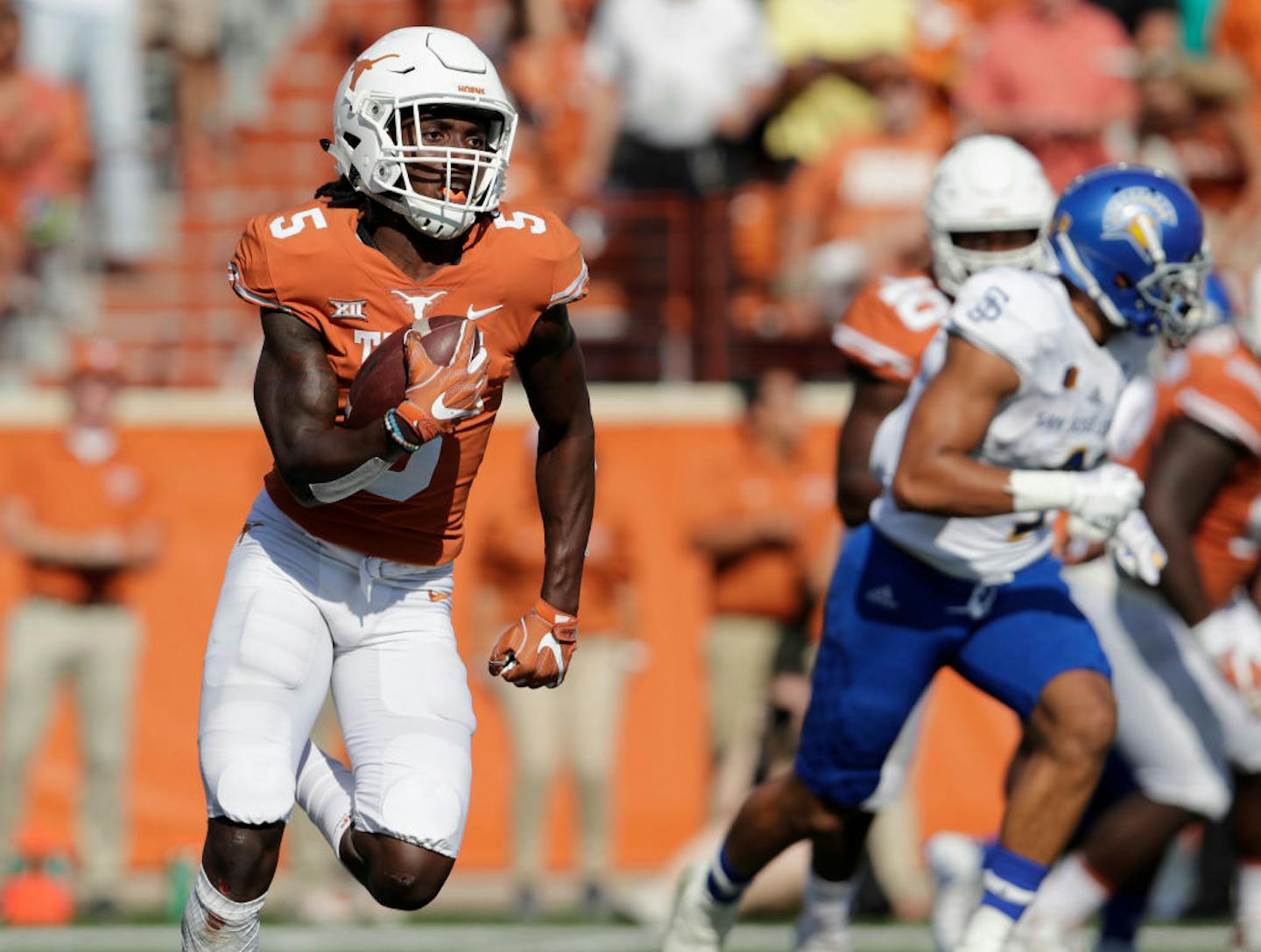 AUSTIN, TX - SEPTEMBER 09:  Holton Hill #5 of the Texas Longhorns returns an interception for a touchdown in the third quarter against the San Jose State Spartans at Darrell K Royal-Texas Memorial Stadium on September 9, 2017 in Austin, Texas.  (Photo by Tim Warner/Getty Images)