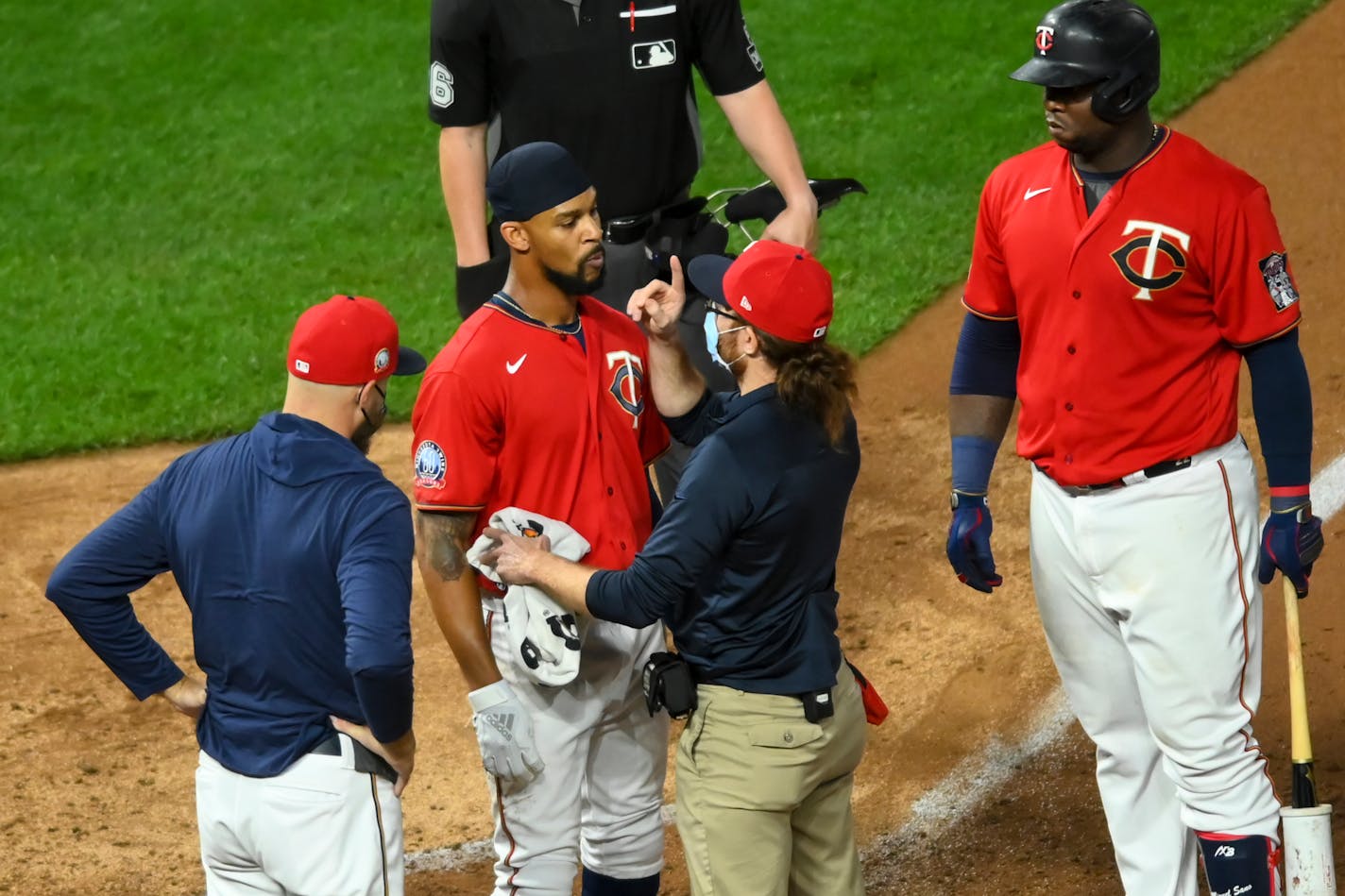 Byron Buxton was checked for a concussion after being struck by a pitch in the bottom of the eighth inning Friday.