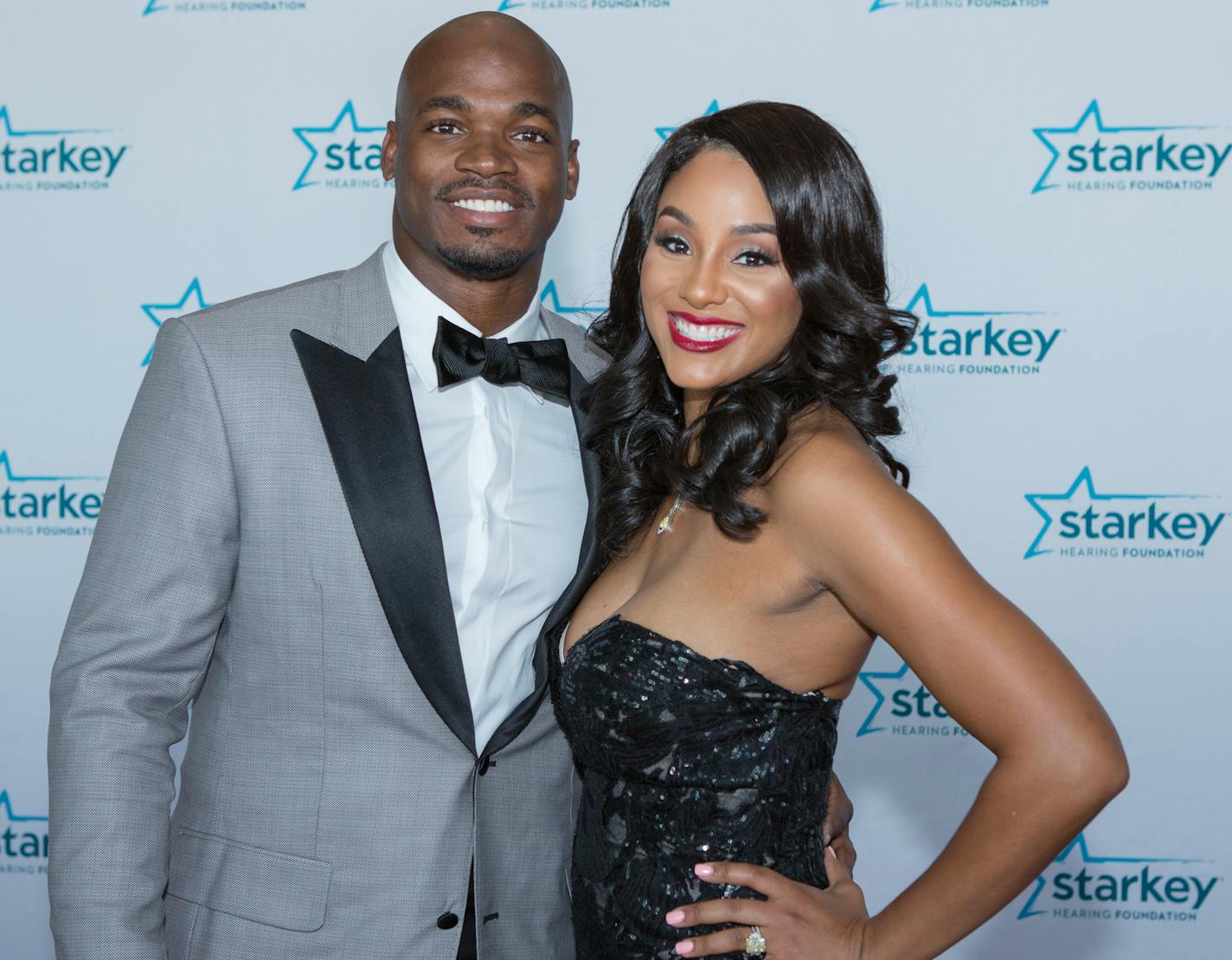 Former Minnesota Vikings running back Adrian Peterson and his wife Ashley on the red carpet at the Starkey Hearing Foundation "So The World May Hear" Gala. [ Special to Star Tribune, photo by Matt Blewett, Matte B Photography, matt@mattebphoto.com, July 16, 2017, Starkey Hearing Foundation "So The World May Hear" Gala, The Saint Paul RiverCentre, St. Paul, Minnesota, SAXO&#x2020;1004106817 STARKEY071717