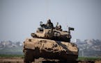 An Israeli tank moved along the border with Gaza on Tuesday, Feb. 6, 2024, in southern Israel.
