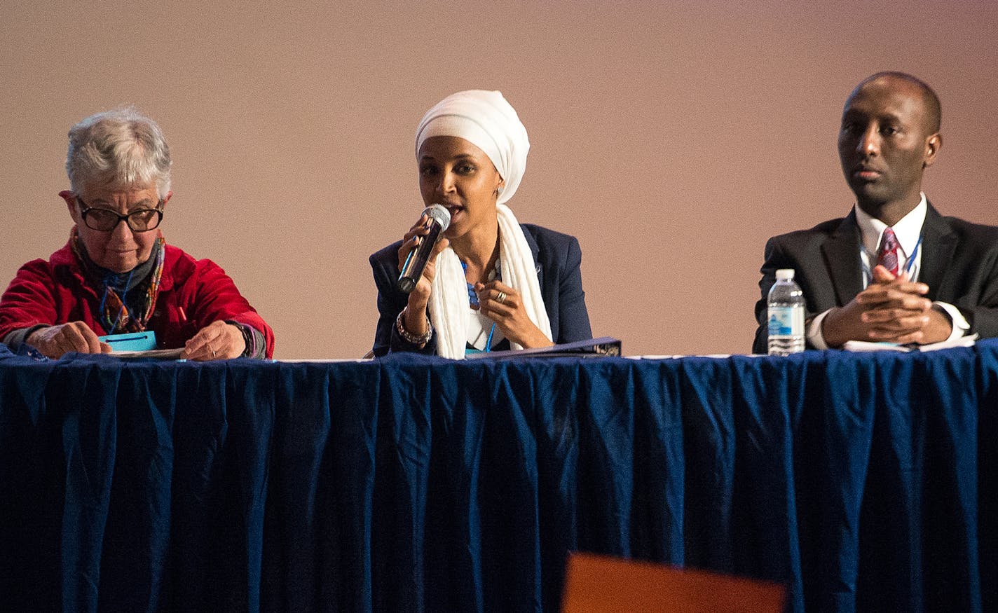 DFL Rep. Phyllis Kahn, left, took part in a Q&A session with fellow candidates Ilhan Omar, center, and Mohamud Noor in the auditorium of Northeast Middle School. ] (AARON LAVINSKY/STAR TRIBUNE) aaron.lavinsky@startribune.com DFL Rep. Phyllis Kahn, the longest serving member of the Minnesota Legislature, faces two insurgent DFL challengers from the Somali community. Her endorsement battle Saturday could be the end of her political career if she loses. She has said she will not run in a primary in