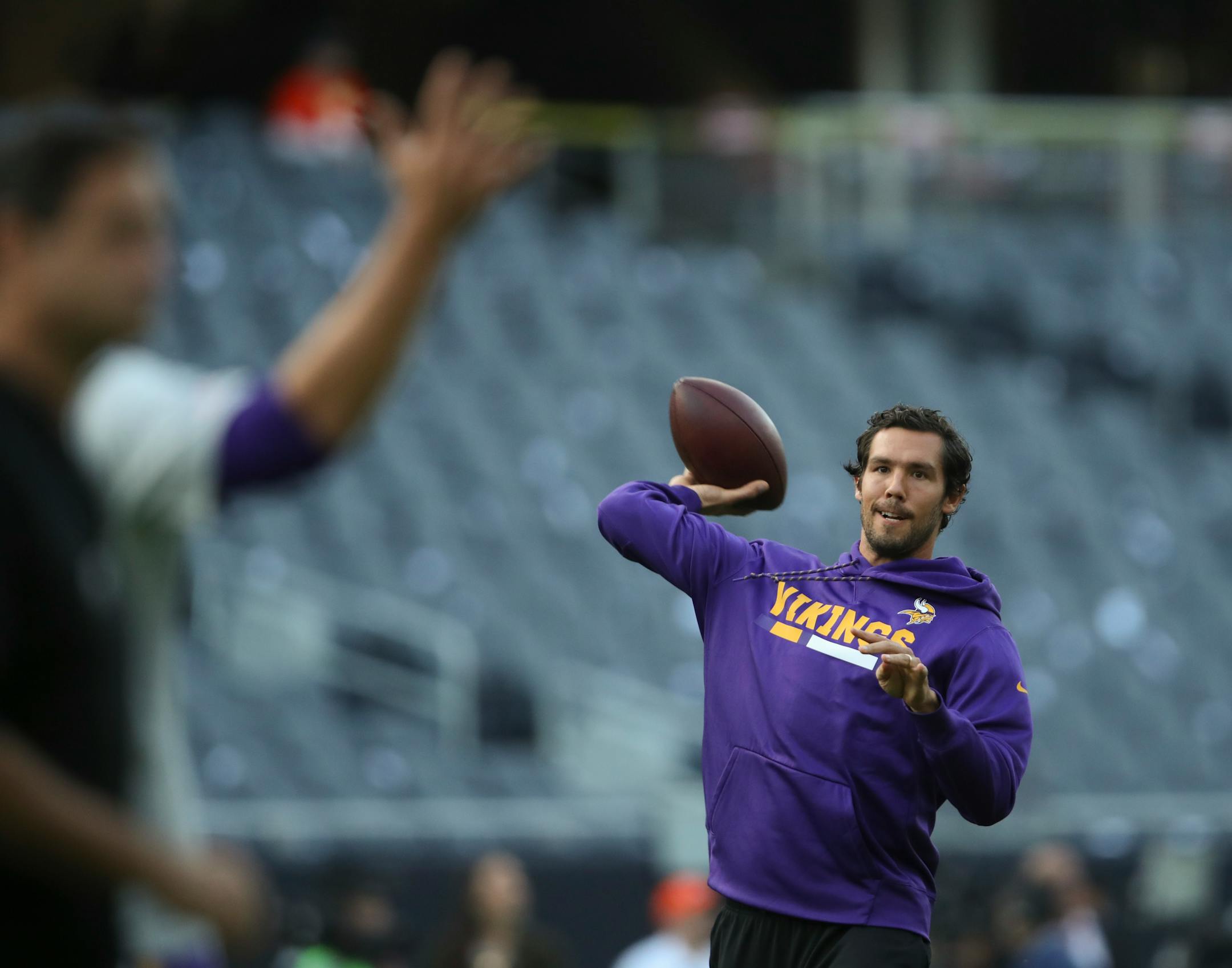 Minnesota Vikings quarterback Sam Bradford was on the field throwing during early warmups Monday evening in Chicago.
