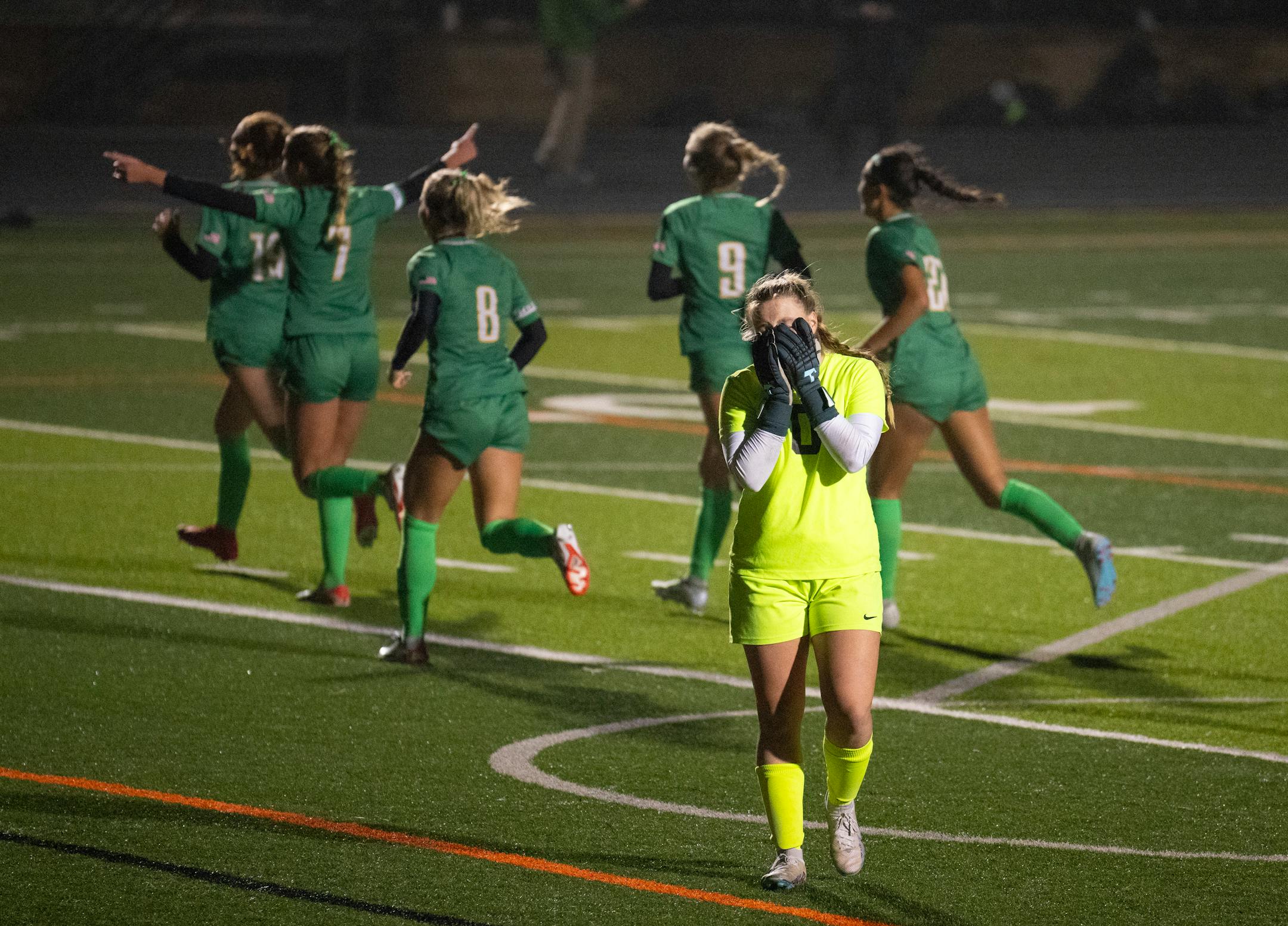 St. Michael-Albertville keeper Brynn Hedberg reacted after Edina's Grace Pohlidal (8) headed in the game winner off a 2nd half corner kick.
