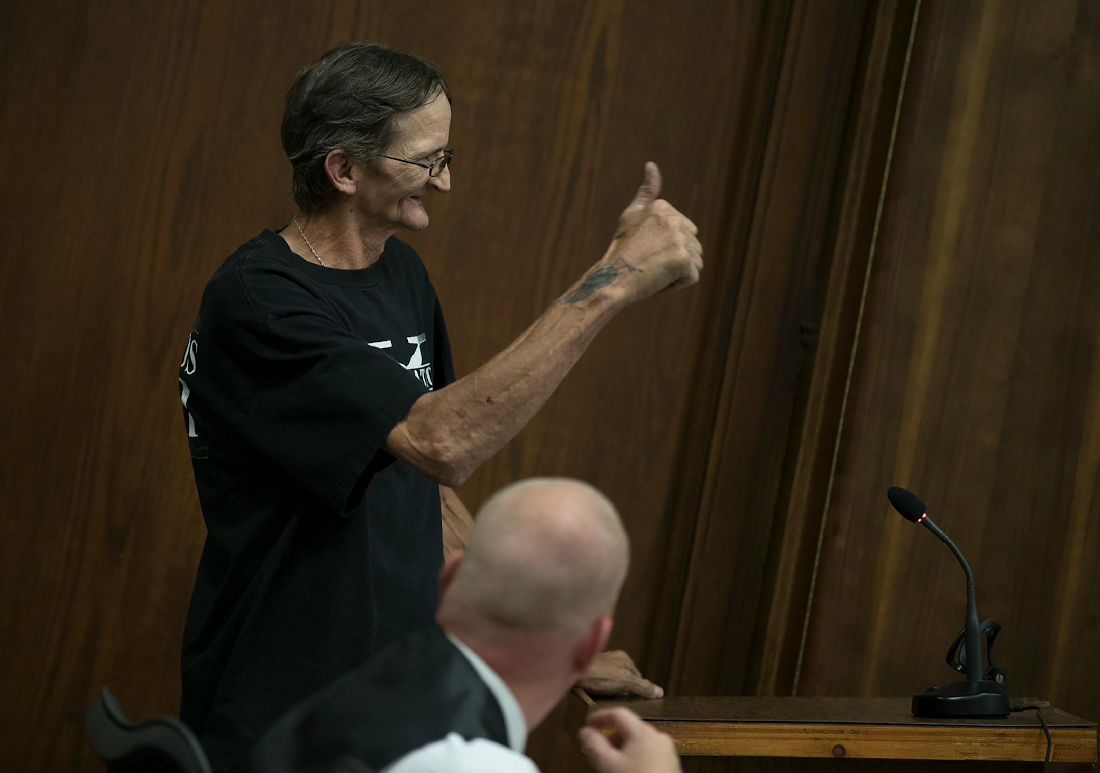 Joseph Bellows gave a thumbs up after checking in with Duluth Judge Shaun Floerke during DWI court, Friday, August 11, 2017 in Duluth, MN.