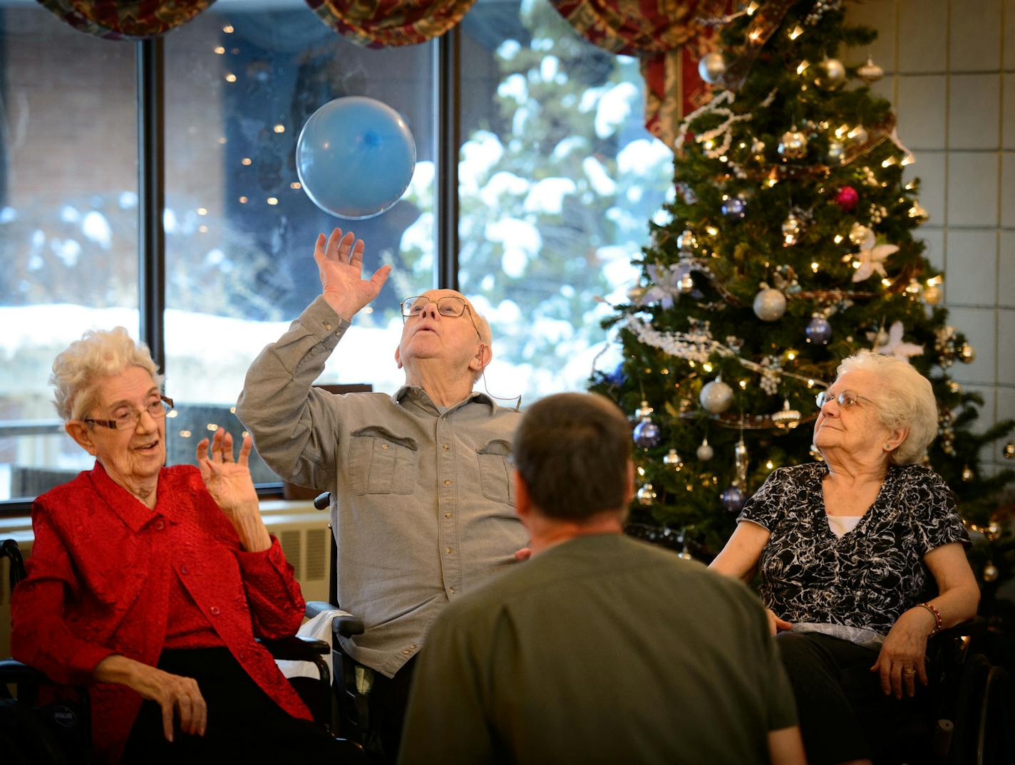 Marian Grunwald, Earl Elfstrom and Verna Matheson bounced a balloon back and forth with CNA Rick Pavlisich. He lead an activity at Ecumen Parmly LifePointes nursing home, Chisago City, for dementia patients participating in the Ecumen Awakenings program, which uses behavior modification to reduce the need for antipsychotic medications. Friday, December 13, 2013 ] GLEN STUBBE * gstubbe@startribune.com