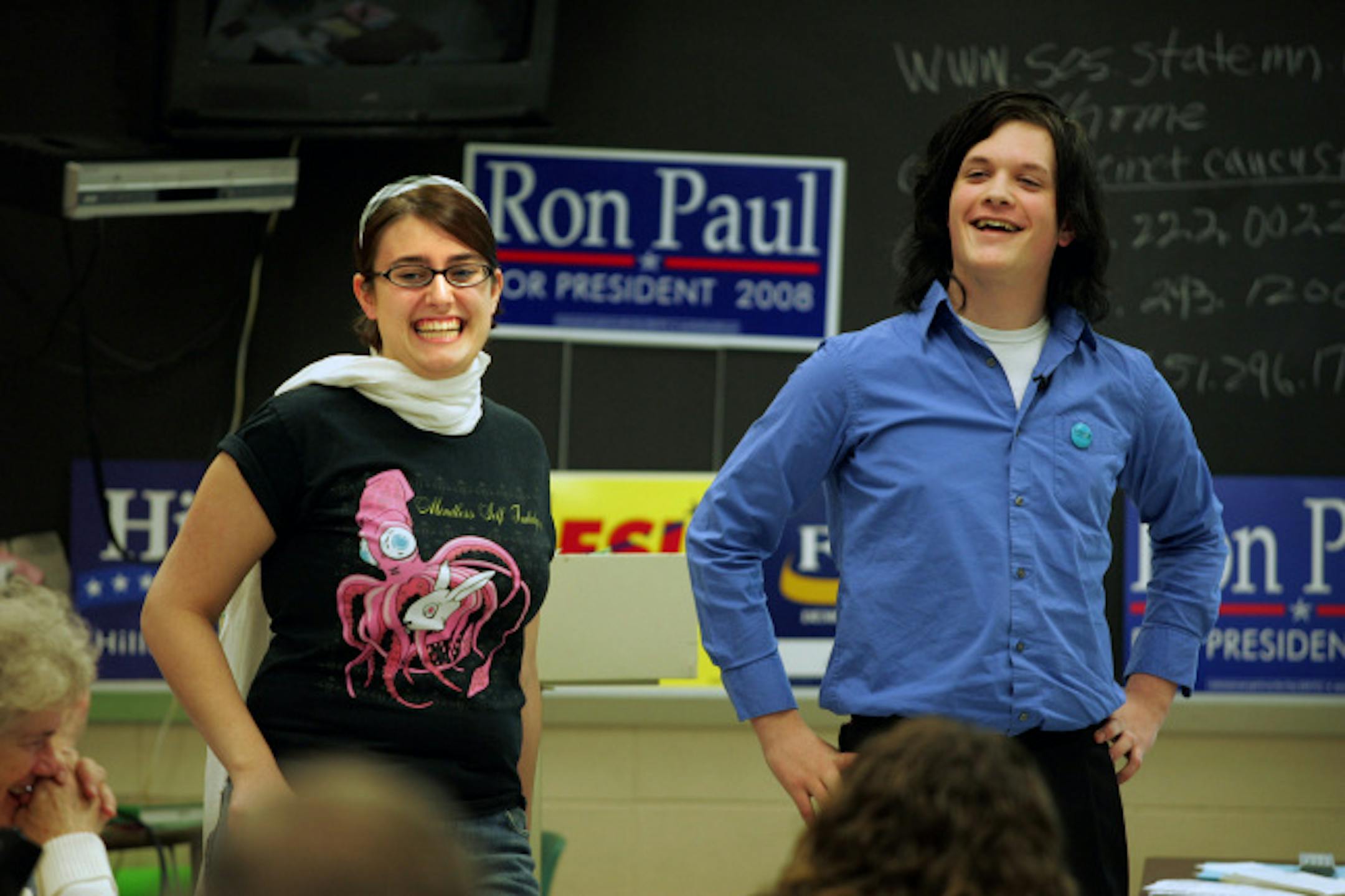 Anoka High School senior Anthony Maki, who organized a forum to educate his peers about the caucus process, and senior Kirsten Dorn demonstrated how to use Robert's Rules of Order .