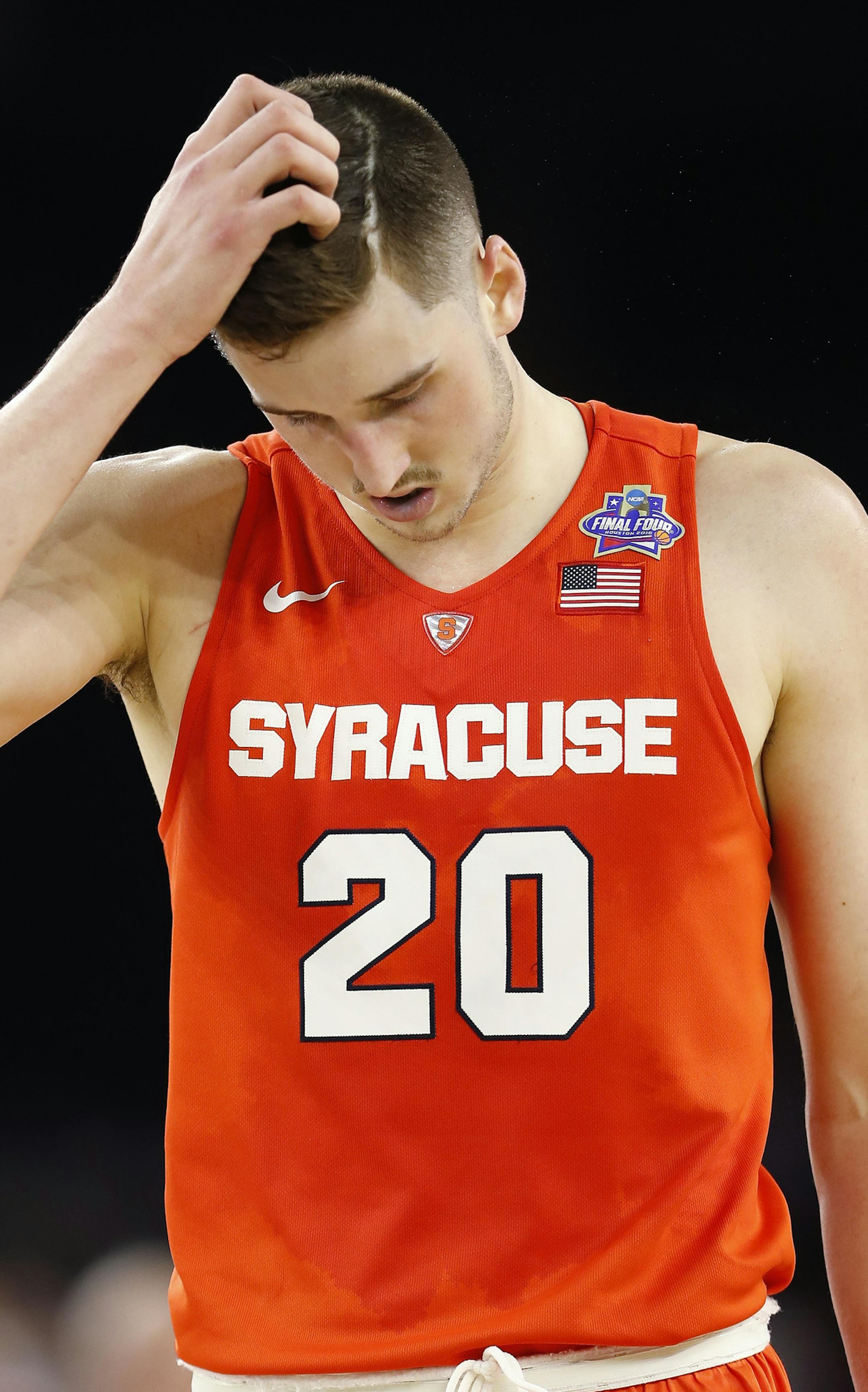 Syracuse forward Tyler Lydon (20) walks down the court during the second half of the NCAA Final Four tournament college basketball semifinal game against North Carolina, Saturday, April 2, 2016, in Houston. (AP Photo/David J. Phillip)