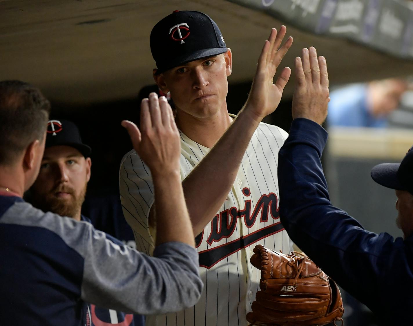 Minnesota Twins starting pitcher Aaron Slegers (50) was high fived by teammates and the coaching staff after being pulled from the game in the top of the seventh inning against the Cleveland Indians. ] AARON LAVINSKY &#xef; aaron.lavinsky@startribune.com The Minnesota Twins played the Cleveland Indians on Thursday, August 17, 2017 at Target Field in Minneapolis, Minn.