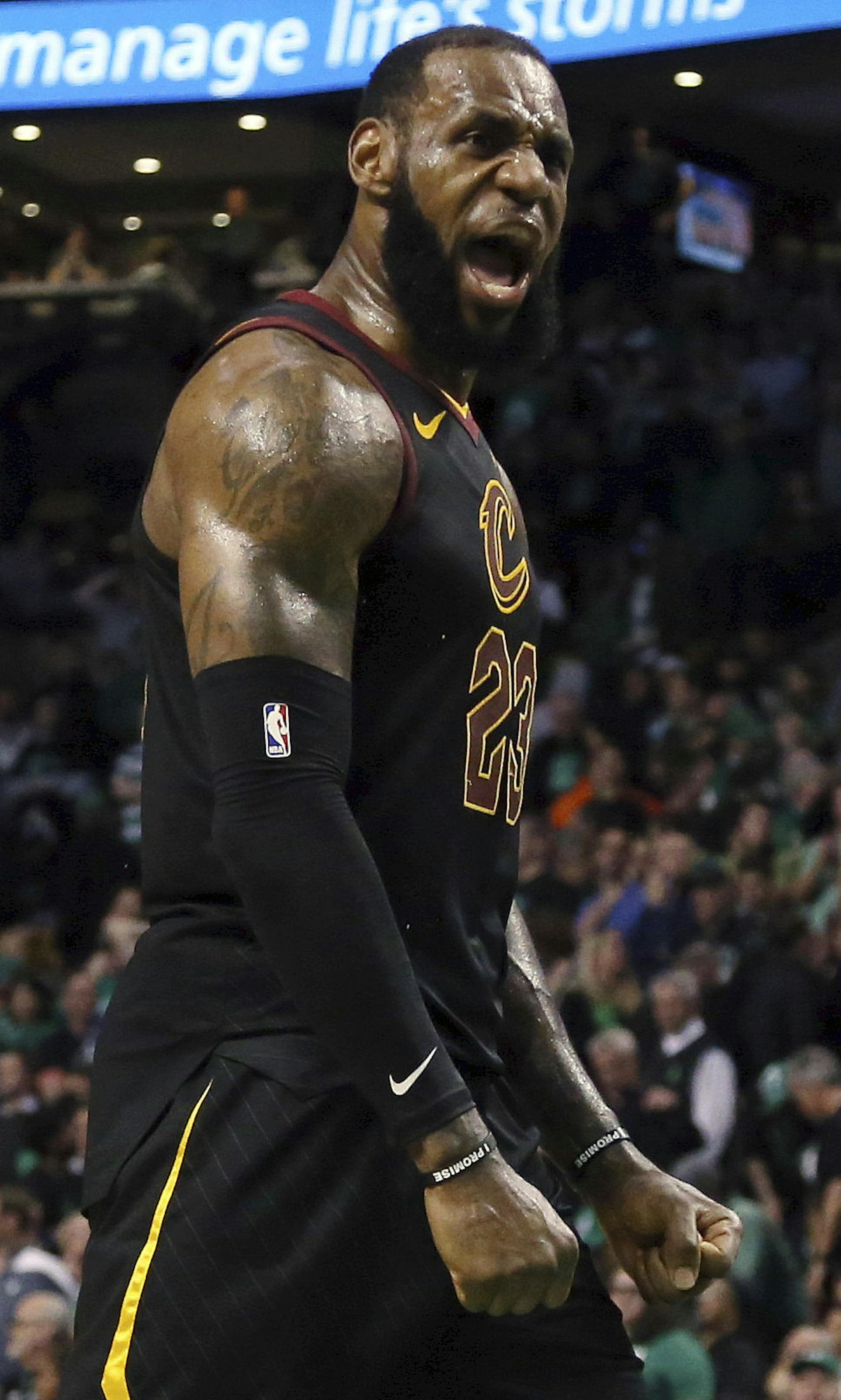 Cleveland Cavaliers forward LeBron James celebrates as his team pulls away from the Boston Celtics near the end of the second half in Game 7 of the NBA basketball Eastern Conference finals, Sunday, May 27, 2018, in Boston. (AP Photo/Elise Amendola)
