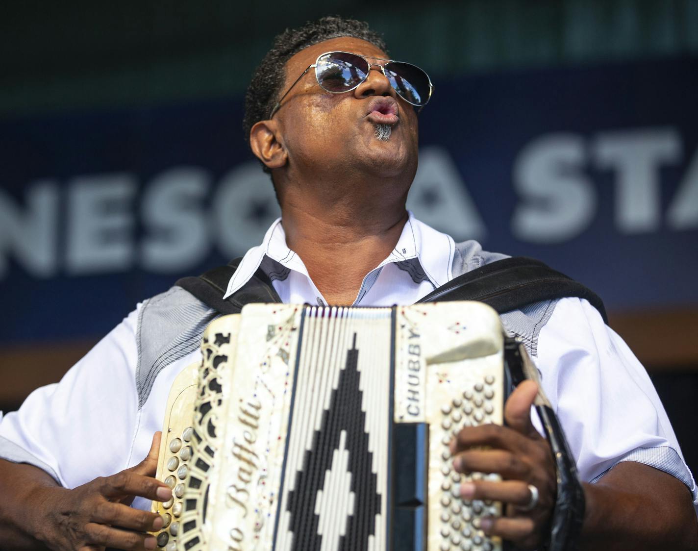 Chubby Carrier performed with his group, the Bayou Swamp Band, at Leinie Bandshell at the Minnesota State Fair on Friday August 23, 2019. Dozens of fans got up to dance with friends and strangers alike.]
ALEX KORMANN &#x2022; alex.kormann@startribune.com Free concerts are spread throughout the state fair each day with everything from local bands to international groups to international super stars. People are encouraged to get up, dance and let loose as they sample music from every genre and gen