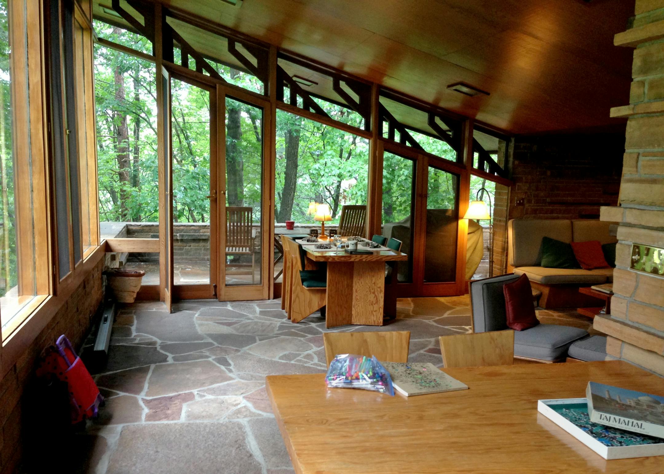 Inside the one-bedroom Seth Peterson Cottage, the furniture and woodwork have all been refurbished over the years sticking close to Wright's original designs.