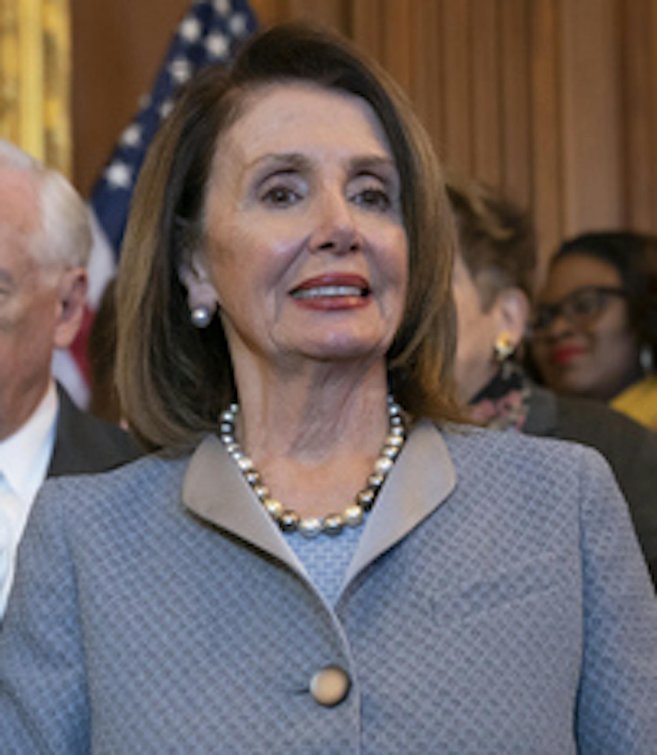 Speaker of the House Nancy Pelosi, D-Calif., attends an event to announce legislation to lower health care costs and protect people with pre-existing medical conditions, at the Capitol in Washington, Tuesday, March 26, 2019. The Democratic action comes after the Trump administration told a federal appeals court that the entire Affordable Care Act, known as "Obamacare," should be struck down as unconstitutional. (AP Photo/J. Scott Applewhite)