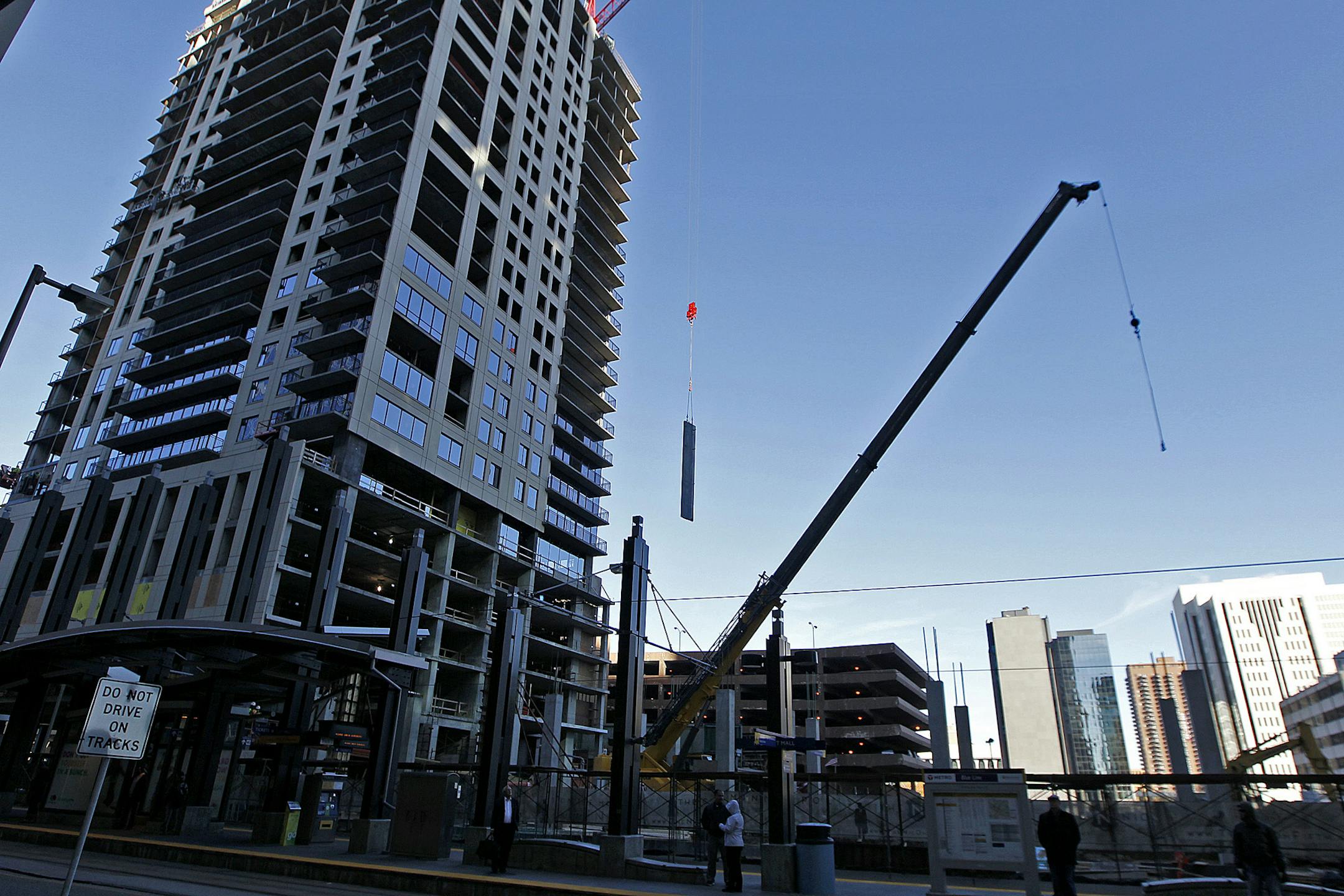 Growth in population has caused a construction boom in the downtown area, including the Nic on Fifth apartment building, shown here under construction in November 2013.