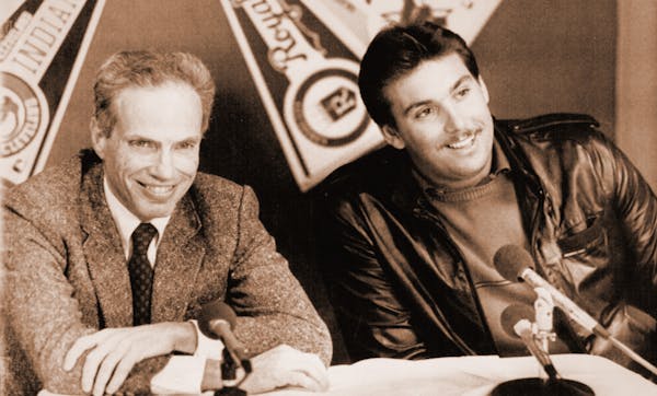 The reaction to over $1 million a year: All smiles from the Twins' Kent Hrbek, right, and his agent Ron Simon.