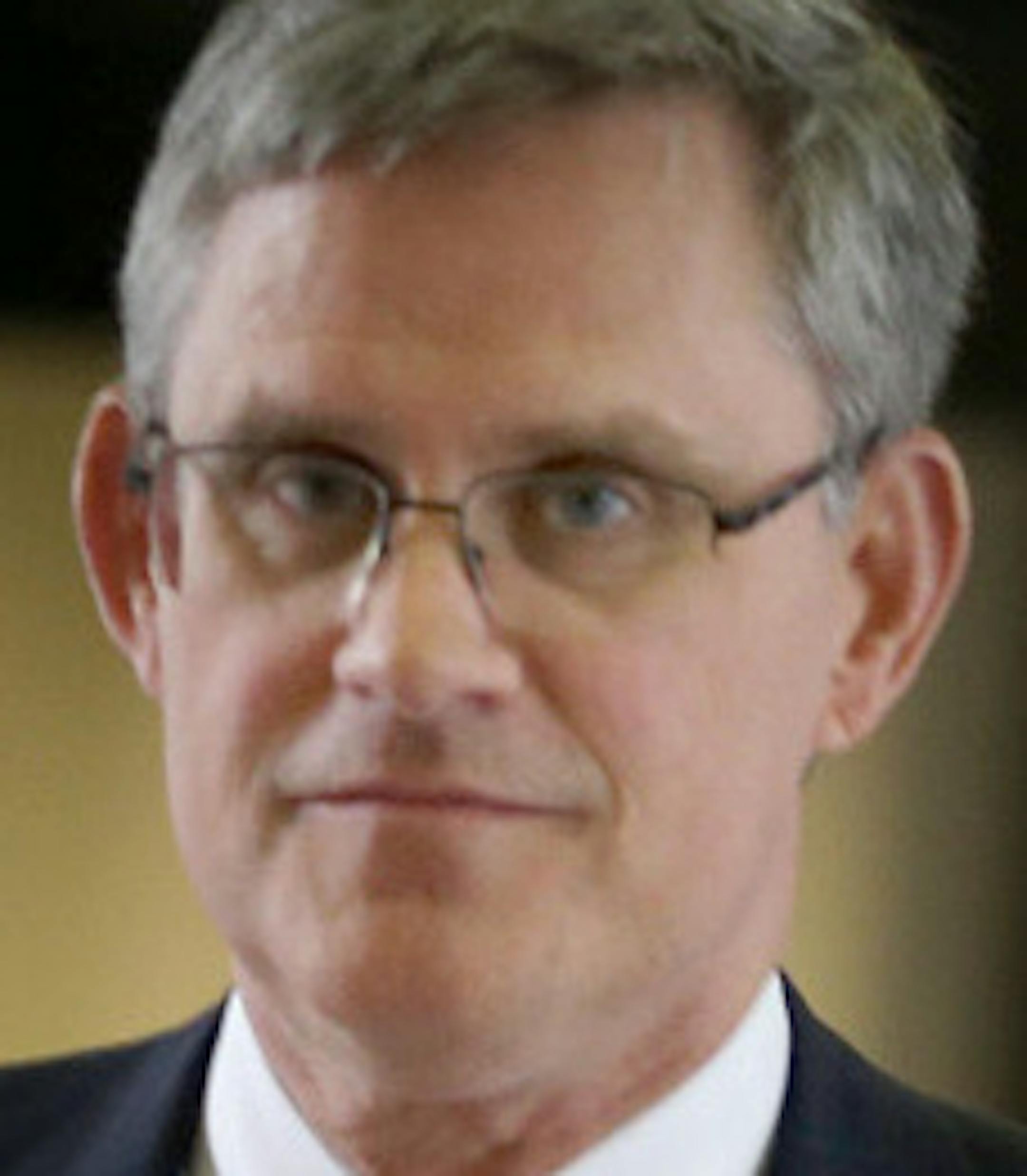 Chris Madel, left, and Paul Engh, right, the original Petters attorneys, made their way out of the Federal Courthouse during lunch break, Wednesday, October 23, 2013 in St. Paul, MN. They were there for a hearing on the motion by Tom Petters to reduce his sentence from 50 years to 30 years, based on a purported pre-trial plea offer by federal prosecutors. (ELIZABETH FLORES/STAR TRIBUNE) ELIZABETH FLORES • eflores@startribune.com