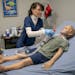 Nurse Heather Grace demonstrated how to change a tracheostomy tube on Pediatric Hal, a simulated 5-year-old patient who helps health care providers tr