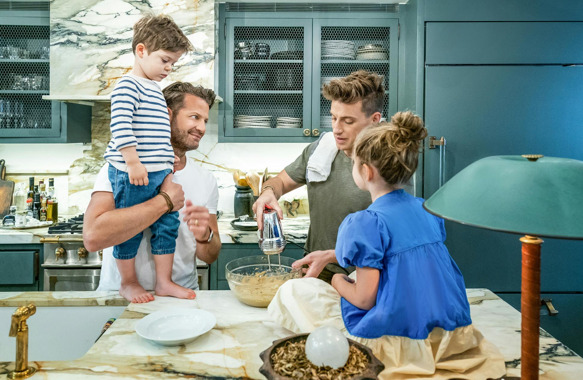 HGTV viewers have a window into the lives of designers and television personalities Nate Berkus, left, and Jeremiah Brent, who often are seen on camera with their children, Oskar Michael and Poppy.