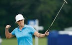 Mel Reid, of England, reacts after making her birdie putt on the 18th green during the final round of the KPMG Women's PGA Championship golf tournamen
