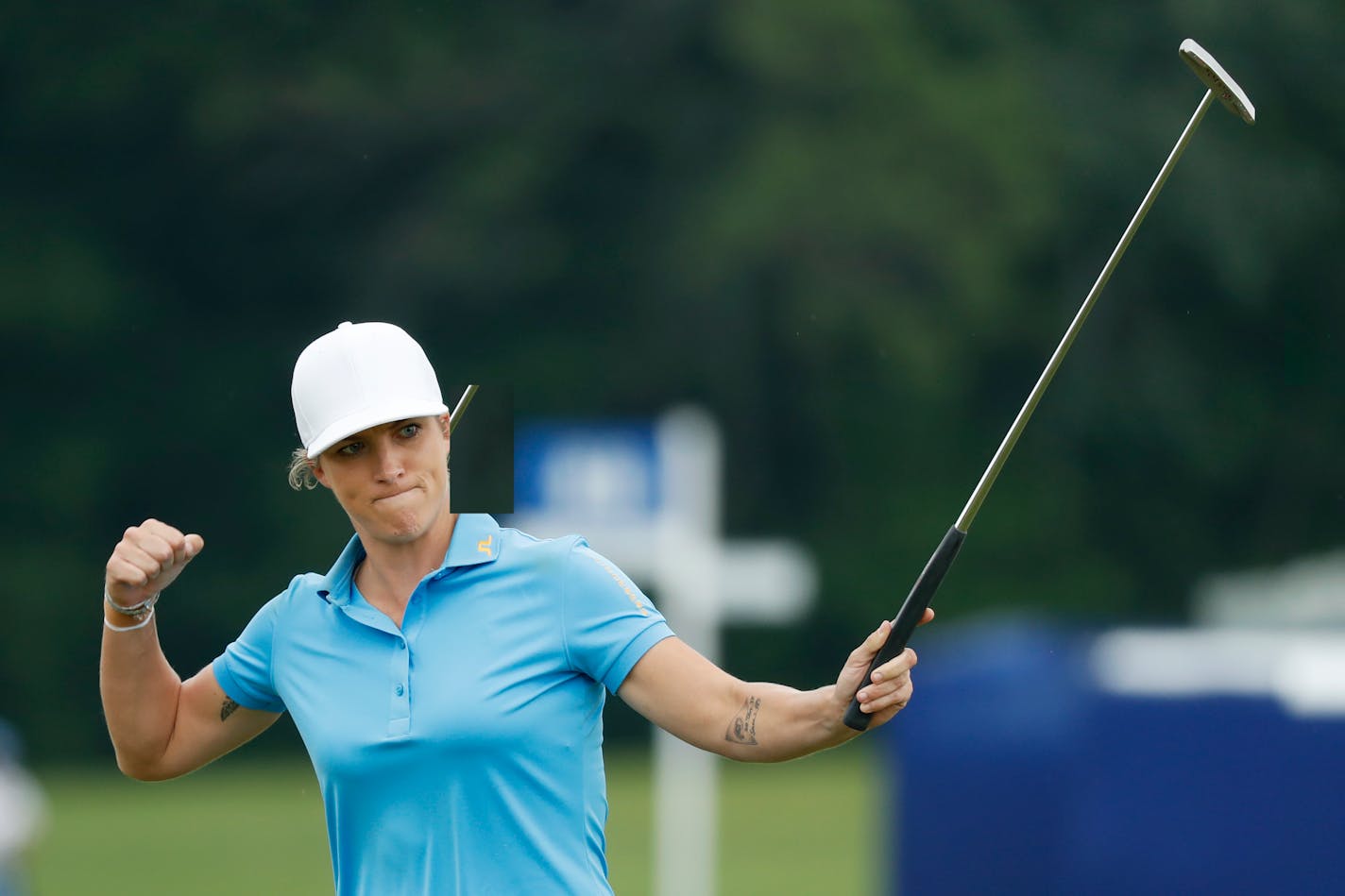 Mel Reid, of England, reacts after making her birdie putt on the 18th green during the final round of the KPMG Women's PGA Championship golf tournament, Sunday, June 23, 2019, in Chaska, Minn. (AP Photo/Charlie Neibergall)