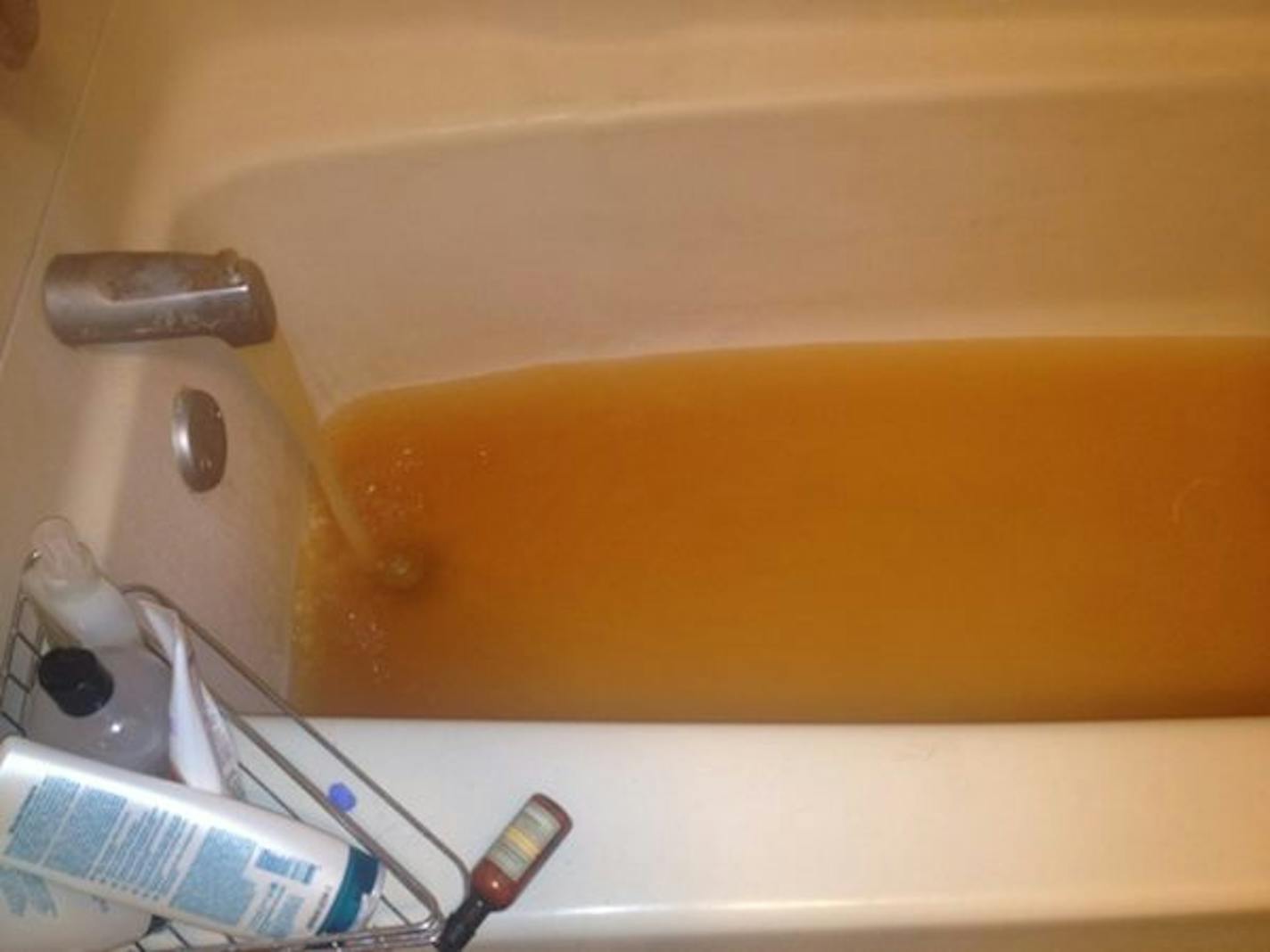 This bathtub at a home in the 2700 block of Hennepin Avenue S. filled up with water that included an unintended hue.