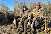 Brothers Henry Ernst, 98, left, and John Ernst, 96, of St. Paul still look to the skies each fall for mallards and other ducks.