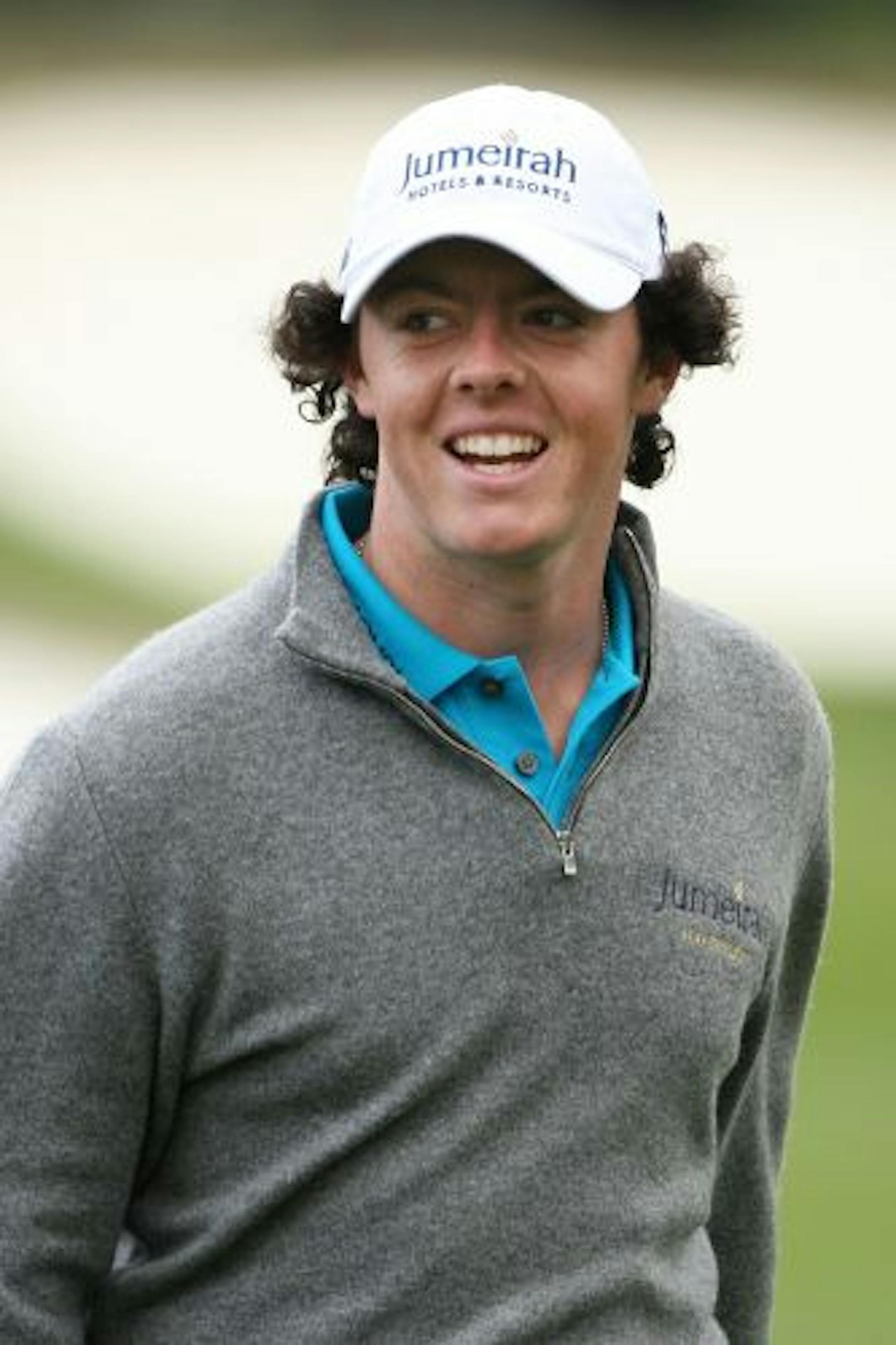 Rapidly rising star Rory McIlroy of Northern Ireland was a picture of joy, not nerves, while making the rounds during practice Tuesday at Augusta National for this week's Masters.