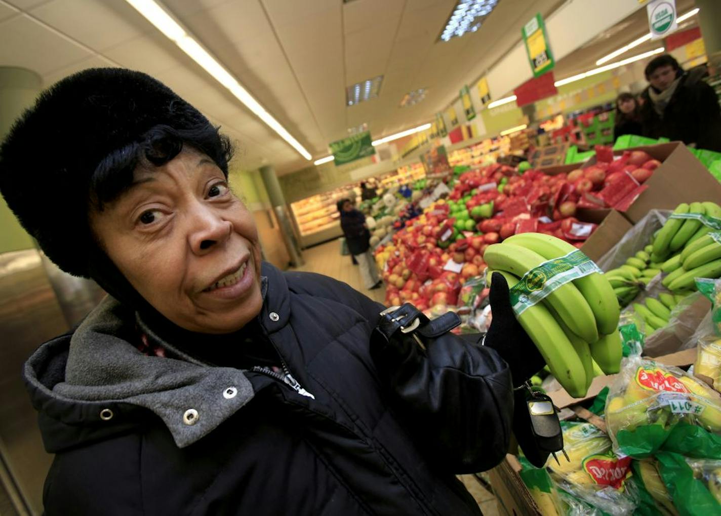 Gloria Ross is a loyal customer of Aldi's in Minneapolis, "I've shopped Cub and Target and just can't get the same value that I get at Aldi's. I'm a loyal customer." Gloria was shopping for organic banana's at Aldi. Aldi, the low-priced supermarket leader, has introduced a limited line of organic produce. This Aldi is located at 2100 E Lake Street in Minneapolis, MN on January 21, 2013.