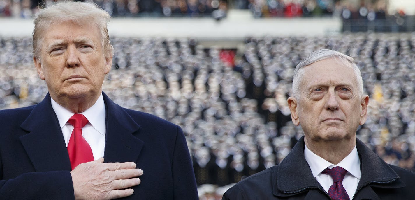 FILE-- President Donald Trump and Defense Secretary Jim Mattis at the annual Army-Navy Collegiate football game at Lincoln Financial Field in Philadelphia, Dec. 8, 2018. Mattis, the four-star Marine general turned defense secretary, will retire at the end of February 2019, President Donald Trump said via Twitter on Dec. 20. (Tom Brenner/The New York Times)