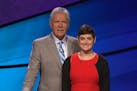 Cindy Stowell stood with "Jeopardy!" host Alex Trebek.