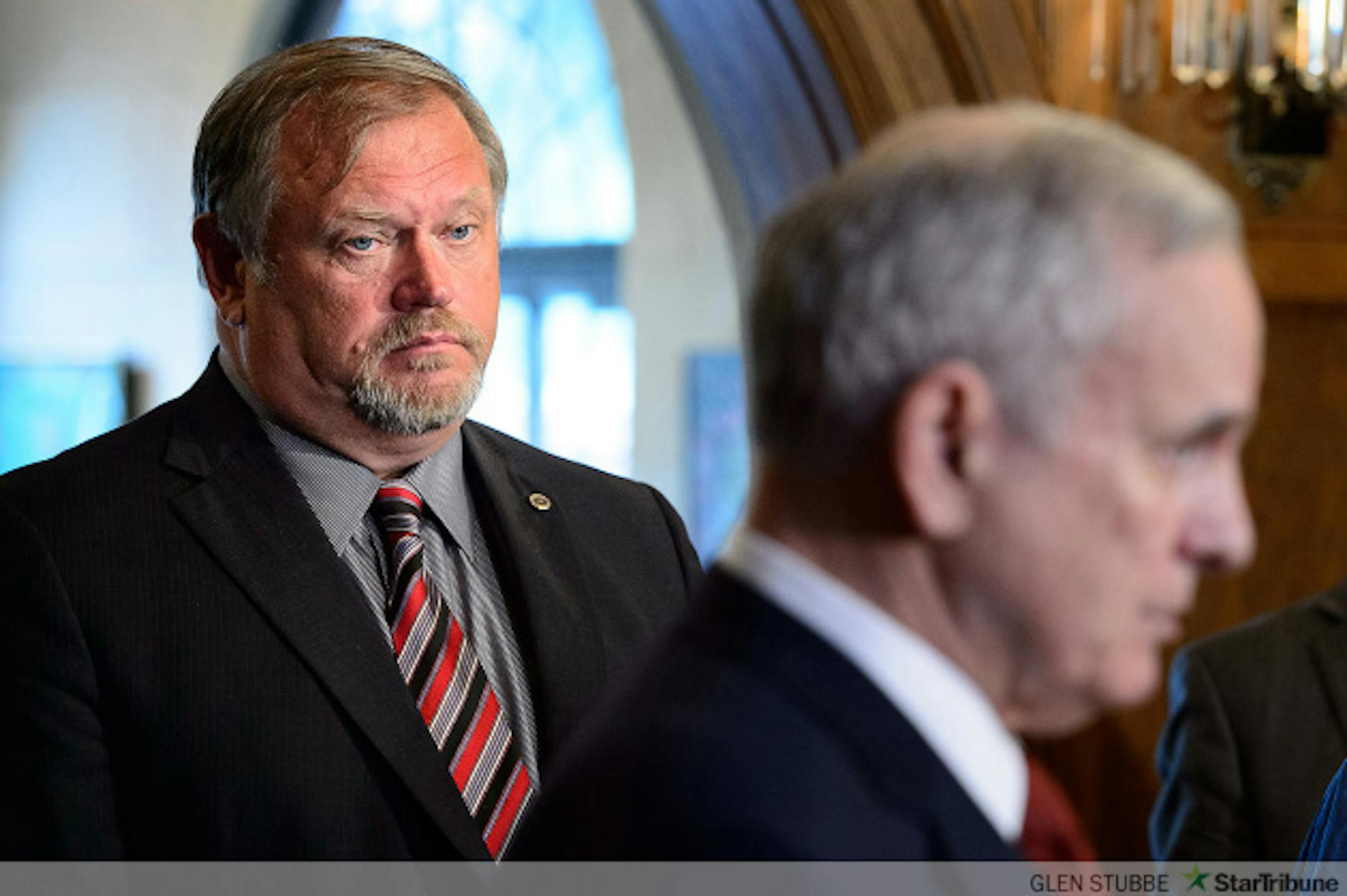 Senate Majority Leader Tom Bakk listens to Gov. Mark. Dayton on Thursday talk about obstacles to finalizing a budget deal.