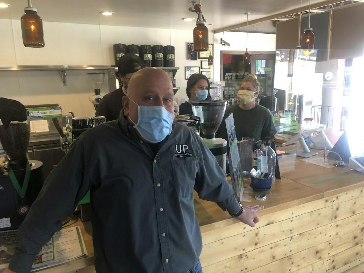 Owner David Chall of 26-year-old UP Coffee Roasters in the last-week reopened cafe-roastery-and-warehouse of the Northeast Minneapolis, 26-employee company. Photo: Neal.St.Anthony@startribune.com