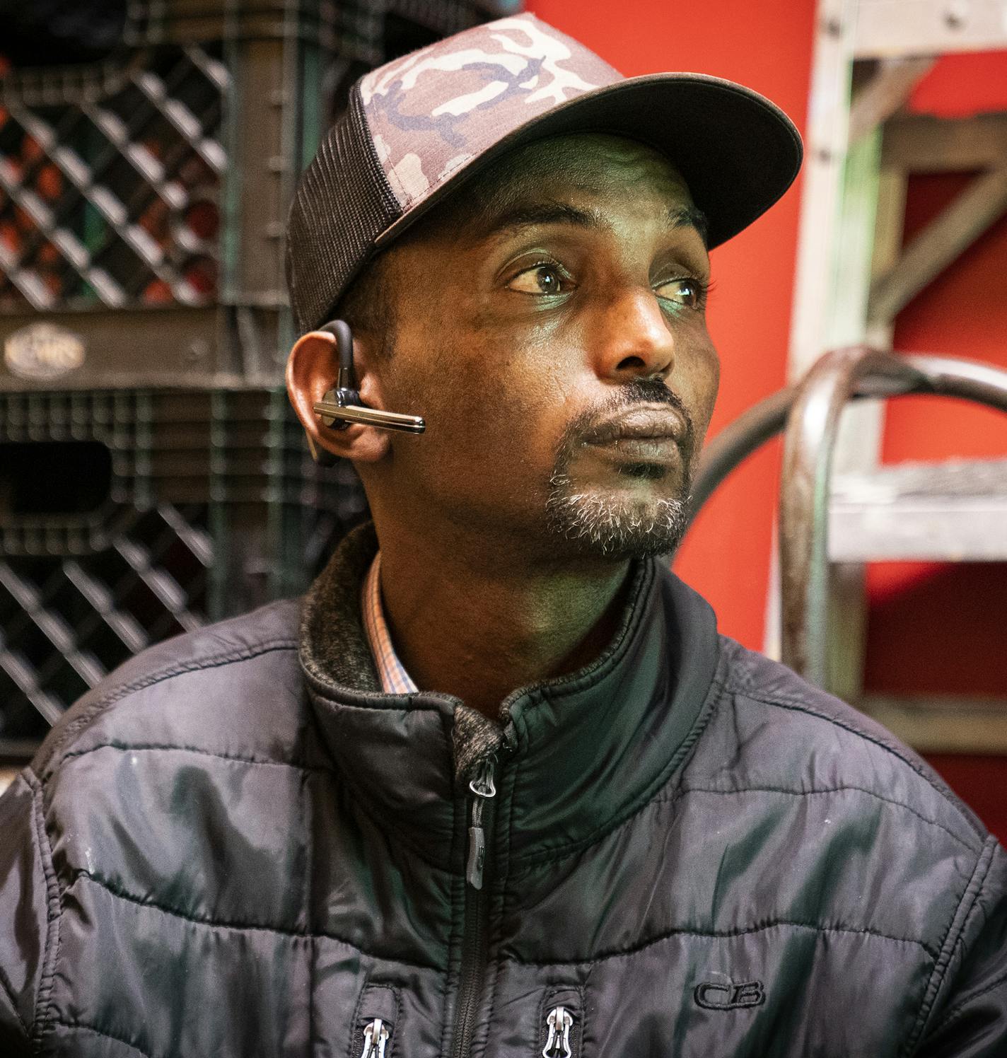 Jama Haji Ali watched a soccer match on television inside a tea shop in Village Market mall. ] LEILA NAVIDI &#x2022; leila.navidi@startribune.com BACKGROUND INFORMATION: Local Somalis react to President Trump's visit at Village Market mall on Friday, October 11, 2019.