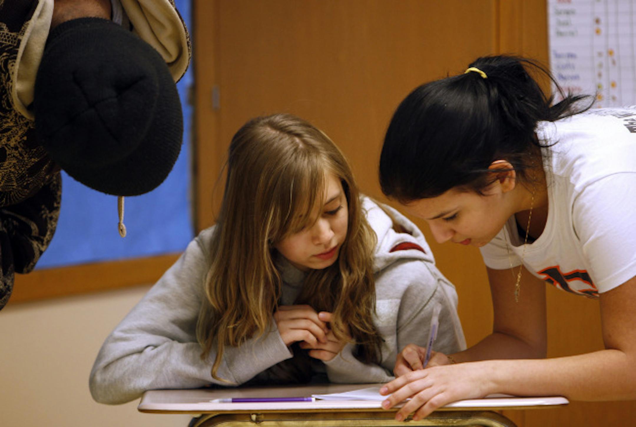 St. Louis Park High students, from left, Arif Mohamed, 17, Samantha Timmerman, 16, and Elizabeth Santiago, 16, participated in an exercise developed by Search Institute, which focuses on the whole youth.