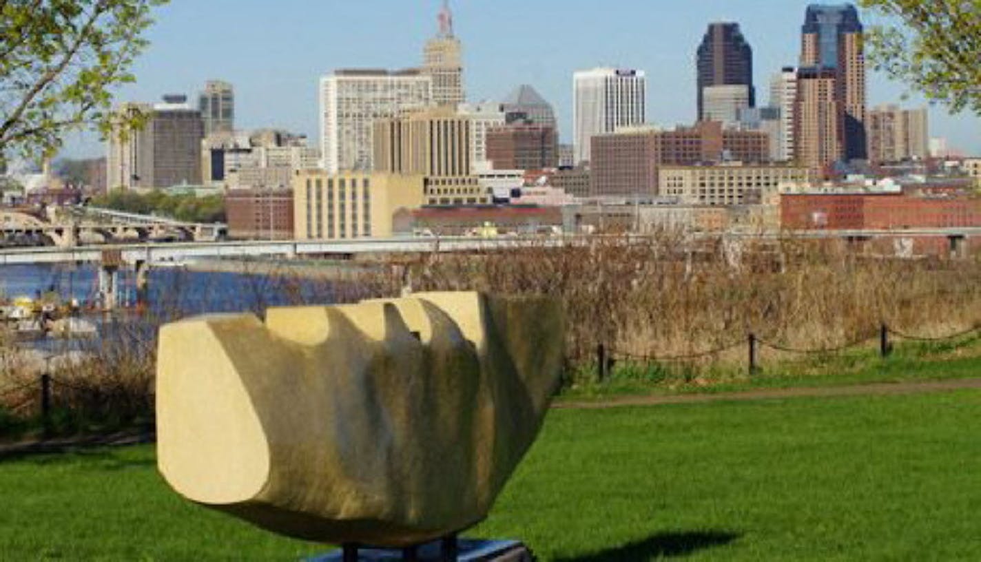 A sculpture by Javier del Cueto overlooks downtown from Indian Mounds Park.