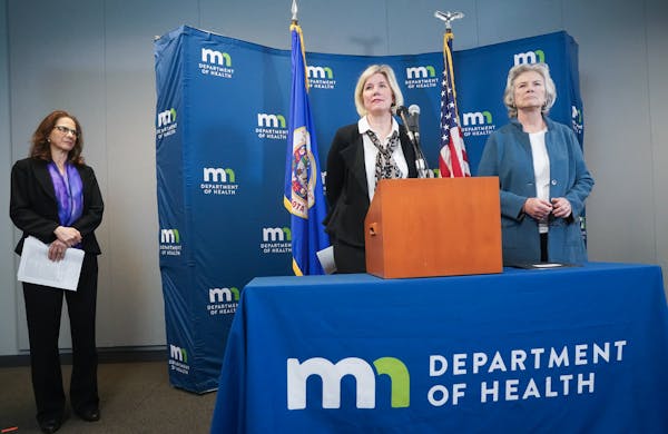 Minnesota Health Commissioner Jan Malcolm, right, along with State Epidemiologist Dr. Ruth Lynfield and Infectious Disease Director Kris Ehresmann hel