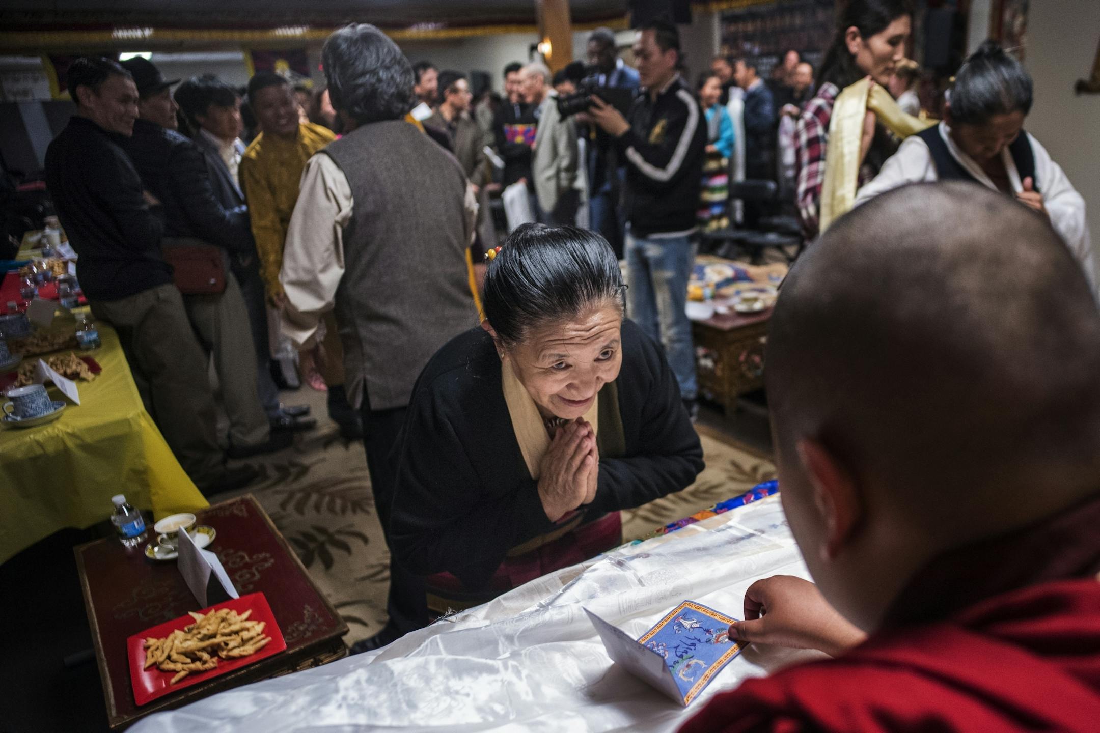 Jalue Dorjee,9, presided over a religious ceremony at the Tibetan American Foundation in St. Paul.