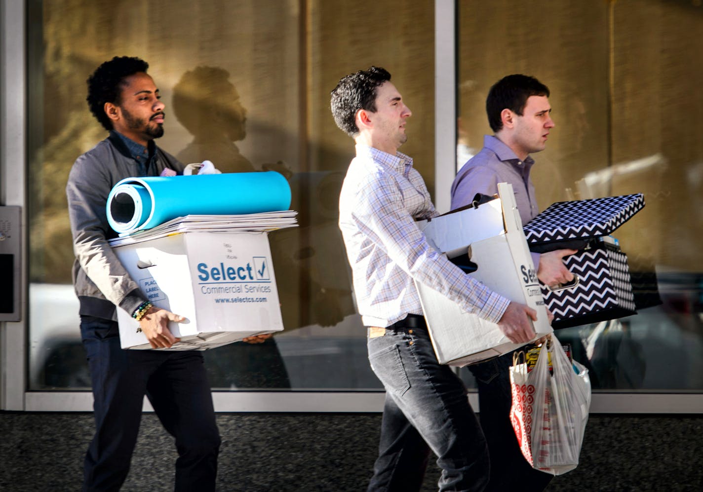 Chris Webley, left, was one of the Target employees laid off Tuesday morning. This is the downtown Minneapolis corporate headquarters where ss many as 1700 Target employees were laid off.