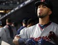 Minnesota Twins left fielder Eddie Rosario (20) looked to the scoreboard from the dugout after losing to the New York Yankees. ] ANTHONY SOUFFLE &#xef